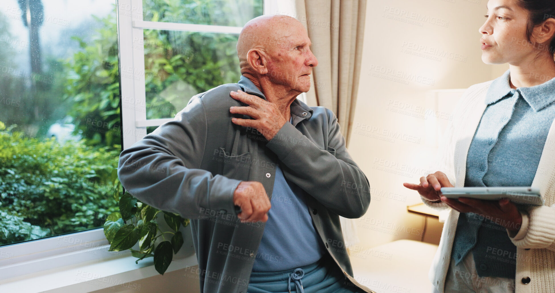 Buy stock photo Healthcare, shoulder pain and tablet with senior man in physio clinic for checkup or feedback. App, conversation and old person in rehabilitation center with chiropractor for consulting or diagnosis