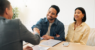 Buy stock photo Handshake, documents and couple in home with financial advisor for savings, planning and budget. Happy, shaking hands and consultant with people for wealth management, future investment and thank you