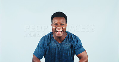 Buy stock photo Celebration, fitness and portrait of black man in studio for achievement of goals or target. Exercise, shouting and space with excited athlete on blue background for milestone, motivation or success