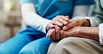Holding hands, consultation and nurse with senior woman in house for medical checkup with comfort. Empathy, compassion and caregiver with elderly patient for healthcare checkup in nursing home.