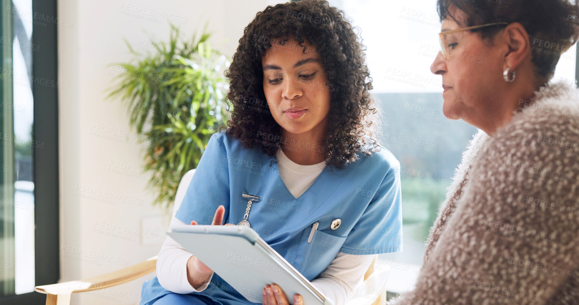 Buy stock photo Caregiver, reading and old woman at house with tablet, research or medical report for diagnosis. Nurse, checkup or senior person in home with digital, assisted living and online survey for healthcare