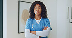Medical, portrait or nurse in home with arms crossed, house service or pride as wellness practitioner. Serious, woman or caregiver with confidence, healthcare industry or about us in assisted living.