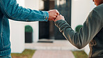 Fist bump, hands and father with child outdoor at home for celebration of property investment. Family, bonding and dad with boy kid for connection, trust or good news on real estate purchase at house