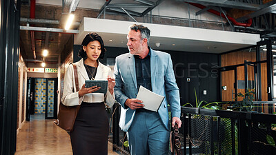 Buy stock photo Walking, tablet and assistant with manager in office for planning, agenda and update on finance report. Corporate, meeting and business people on tech for financial review, feedback and discussion