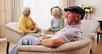 Thinking, elderly man and memory on couch, contemplating and old friends with gossip in living room. Serious, reflection and senior people in lounge, discussion and remember past on break in house