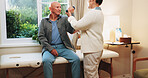 Old man, dumbbells and physiotherapist in office for fitness, guidance and physio for recovery. Therapist, helping and senior person in workplace with gear, physical therapy and rehabilitation advice