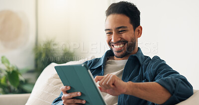 Buy stock photo Streaming, digital or man on couch with tablet, video subscription or post update on online site. Happy, relax or person in house with tech, internet search or show binge on entertainment platform.
