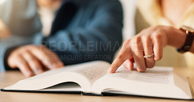 Buy stock photo Hands, reading or Bible study for religion in home, pointing and review scripture with faith in God. People, book and learning Christianity for worship, bonding and spiritual growth with gospel