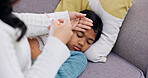 Fever, forehead and hand of mother with daughter on sofa in home living room for childcare. Rest, temperature and thermometer with woman checking girl in apartment for healthcare and recovery