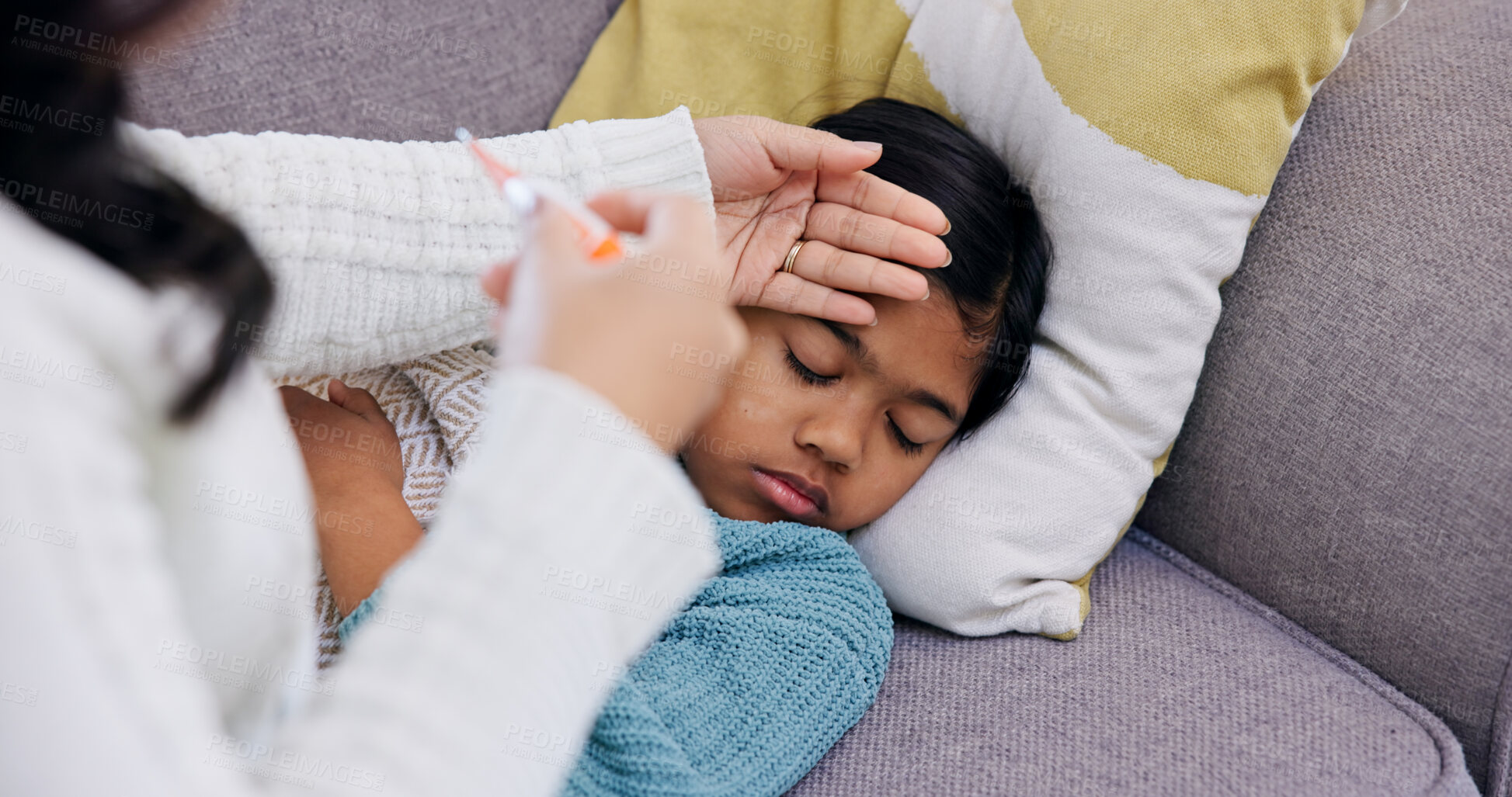 Buy stock photo Fever, forehead and hand of mother with daughter on sofa in home living room for childcare. Rest, temperature and thermometer with woman checking girl in apartment for healthcare and recovery