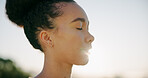 Breathing, eyes closed and fresh air with woman outdoor for health, vitality or wellness in morning. Break, peace and space with African person in nature for deep breath, mindfulness or recovery