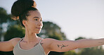 Fitness, woman and stretching outdoor with yoga, good posture and self care for holistic health. Active, female person and yogi in nature with warrior pose, movement and exercise for wellness. 