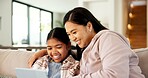 Tablet, happy and mom with child on sofa in home for playing educational game on app together. Smile, digital technology and mother with girl kid for online gaming with learning in apartment.