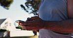 Fitness, app and phone with hands of man in park for message, tracker and social media. Summer, communication and training with person in nature for health, digital tech and workout planning outdoor