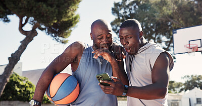 Buy stock photo Exercise, app and phone with black people on basketball court for message, tracker and social media. Summer, excited and training with happy friends in park for health, tech and sport highlights