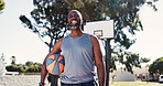 Portrait, black man and ball on court for basketball, practice match and weekend hobby for contest. Below, mature person and smile at park for fitness, sports training and pride for competition game