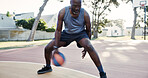 Athlete, black man and ball on court for basketball, practice shooting and technique for match. Mature person, play and dribble at park for fitness, sports training and bounce skills for competition