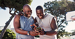 Fitness, app and phone with black people on basketball court for message, tracker and social media. Summer, communication and training with happy friends in park for health, tech and sport highlights