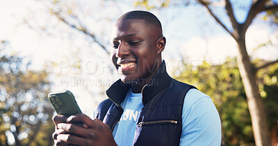 Buy stock photo Phone, black man and volunteer in nature for email feedback on community outreach or NGO project. Happy, outdoor and charity worker with cellphone for texting of contact for non profit update in park