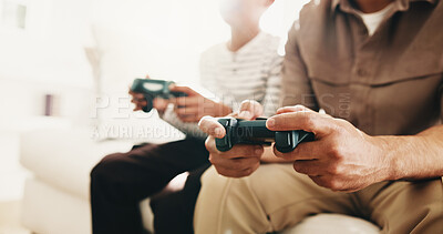 Buy stock photo Break, gaming and hands of parent with child on living room sofa for bonding, competition or fun. Hobby, remote control and video game with family in home together for learning, playing or teaching