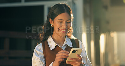 Buy stock photo Phone, smile and businesswoman in city with texting, feedback and email for finance report. Happy, technology and financial advisor with cellphone for update on investment growth in urban town