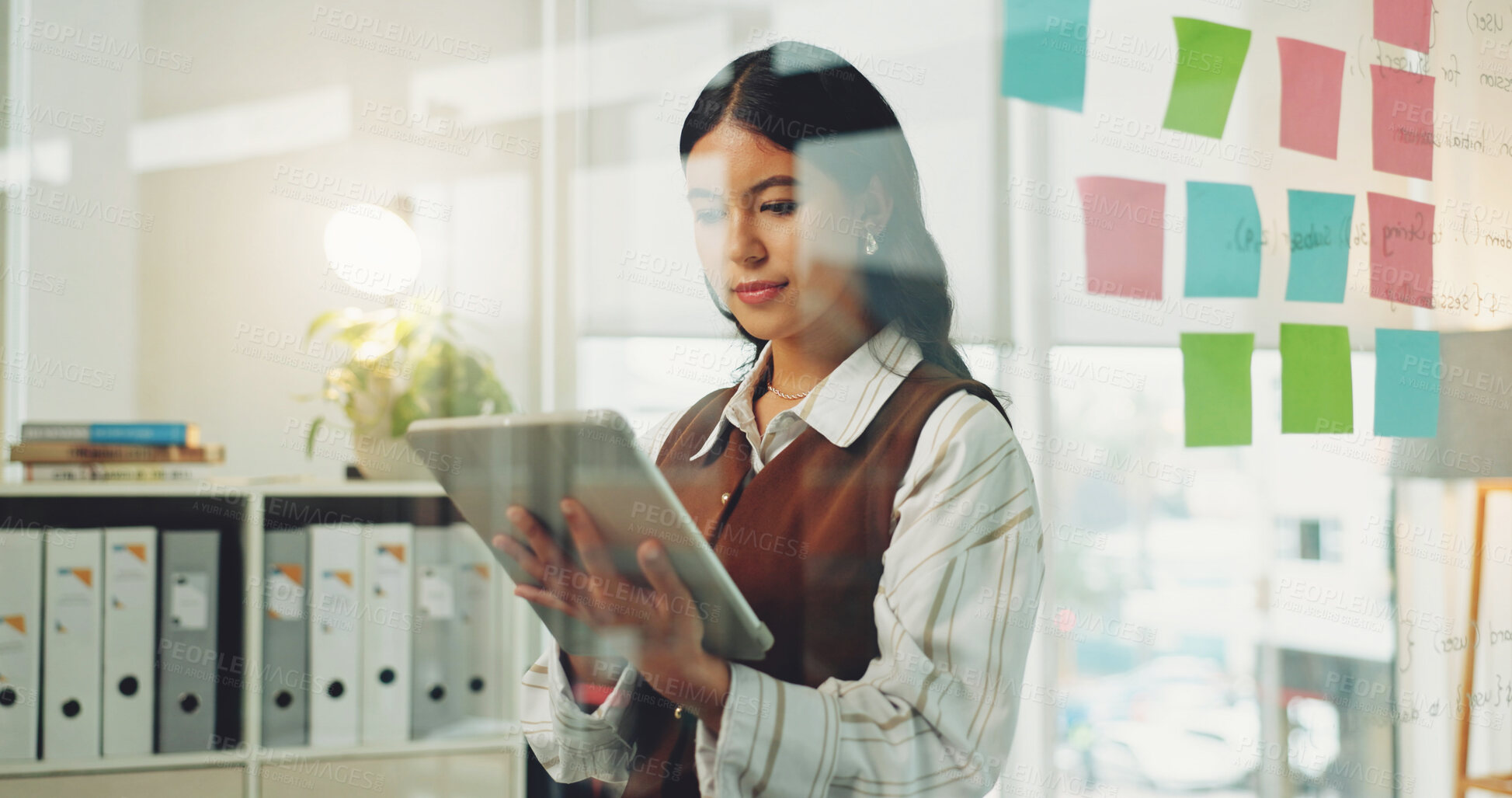 Buy stock photo Tablet, office or business woman by glass wall for commercial real estate, sales or rental lease. Tech, reading or person in company for property development, report or review listing on internet
