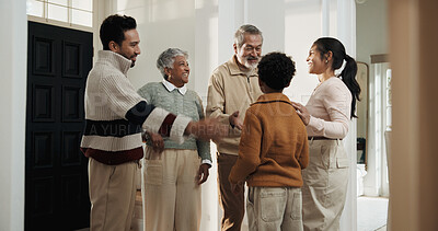 Buy stock photo Child, happy parents and senior people in home together for bonding, family security or visit. Break, connection and grandson greeting grandparents in apartment for weekend with mother and father