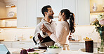 Dancing, smile and couple in kitchen at house listening to music, playlist or radio together. Happy, love and man with woman for moving to song for bonding, care and connection in home on weekend.