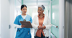 Nurse, checkup and woman at hospital with folder, test results and medical history for diagnosis. Employee, walking and mature person in lobby with documents, patient discharge and healthcare records