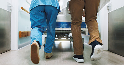 Buy stock photo Doctor, nurse or legs running with hospital bed, medical emergency or collaboration for patient care. Back, people and healthcare team moving in clinic hallway with gurney, help and rush to surgery.