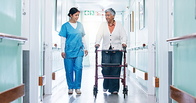 Buy stock photo Nurse, physiotherapy and woman in hospital with walker, checkup and help for stroke rehabilitation. Worker, support and mature person in clinic hallway with mobility aid, physical therapy or healing.