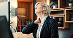 Mature, businesswoman and neck pain in office with computer, burnout and fatigue from accounting job. Tired, person and accountant in firm with desktop, bad posture and inflammation from work stress.