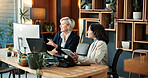 Business, people and meeting in office with computer, personal assistant and planning for schedule. Mature women, manager and executive secretary in workplace with pc, review calendar and discussion.