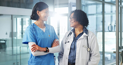 Buy stock photo People, doctor and nurse at hospital with smile, consulting and medical advice for diagnosis. Happy, women and team in lobby with arms crossed, discussion and surgery feedback for healthcare services