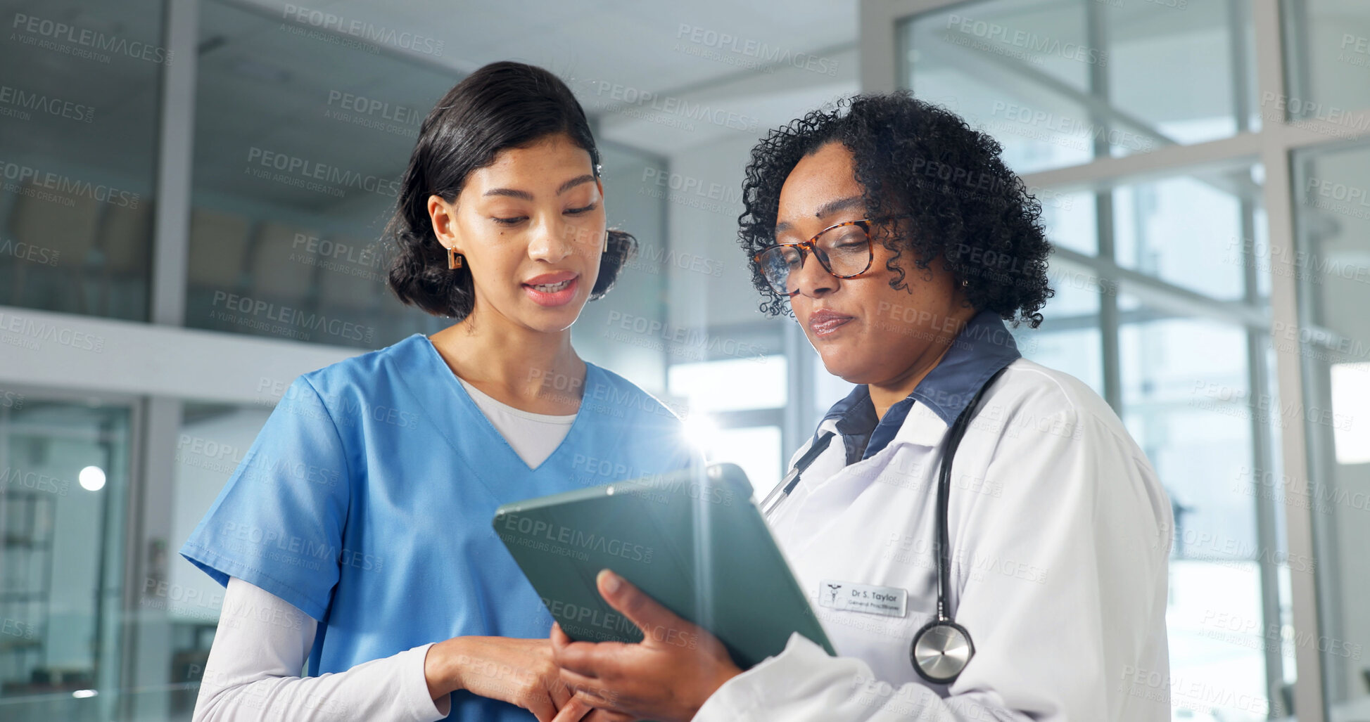 Buy stock photo Medical, feedback and women with tablet, hospital records and patient review for treatment plan. Flare, doctor and nurse with tech, diagnosis discussion and healthcare research in post surgery.