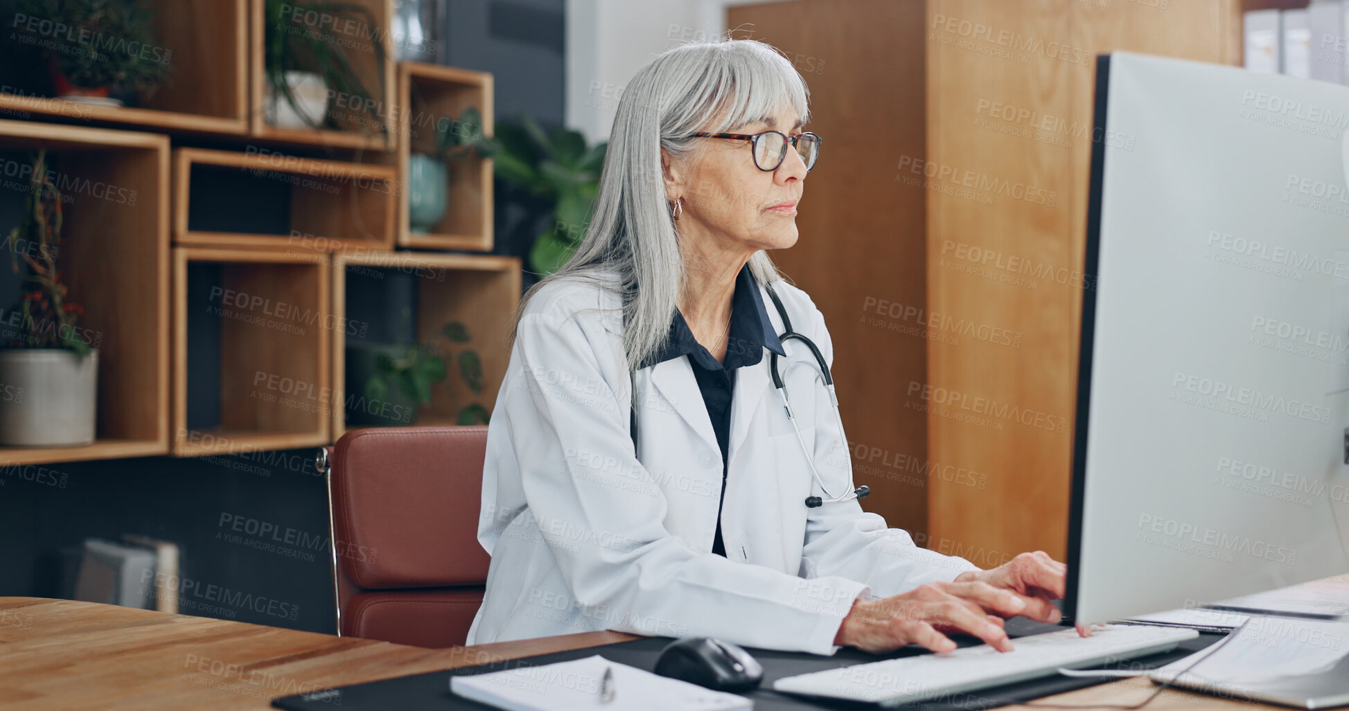 Buy stock photo Doctor, typing and woman with computer in hospital, healthcare or reading treatment plan on website. Clinic, medical professional and mature person with technology, online and checking diagnosis