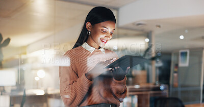 Buy stock photo Glass, tablet and business woman at night for project management, research and marketing campaign. Window, happy and person on tech for website, planning and budget proposal for brand advertising