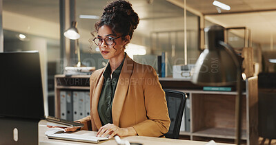 Buy stock photo Online, research and businesswoman with laptop in office, budget review and financial plan at night. Accountant, working late and person with tech, serious and checking expenses on web in business