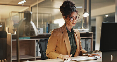 Buy stock photo Reading, research and businesswoman with laptop in office, budget review or financial plan at night. Accountant, working late and person with tech, serious and checking expenses on web in business