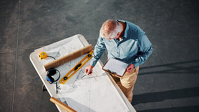 Buy stock photo Blueprint, architecture and clipboard with above of man for building, construction site and renovation. Remodeling project, progress report and floor plan with mature person for engineer and layout