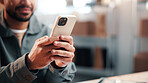 Hands, man and phone in small business for logistics, courier coordination or package tracking. Supply chain, person and mobile app in startup for route search, delivery schedule or customer enquiry