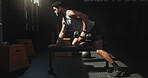 Man, earphones and dumbbell exercise in gym with fitness, bodybuilding and listen to music playlist. Bodybuilder, person and audio tech in health club with radio, weightlifting and strength training.