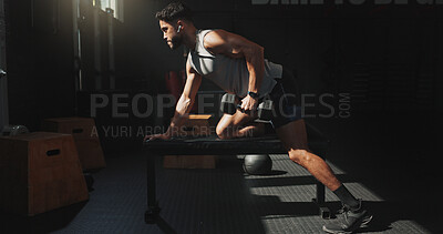 Buy stock photo Man, earphones and dumbbell exercise in gym with fitness, bodybuilding and listen to music playlist. Bodybuilder, person and audio tech in health club with radio, weightlifting and strength training.
