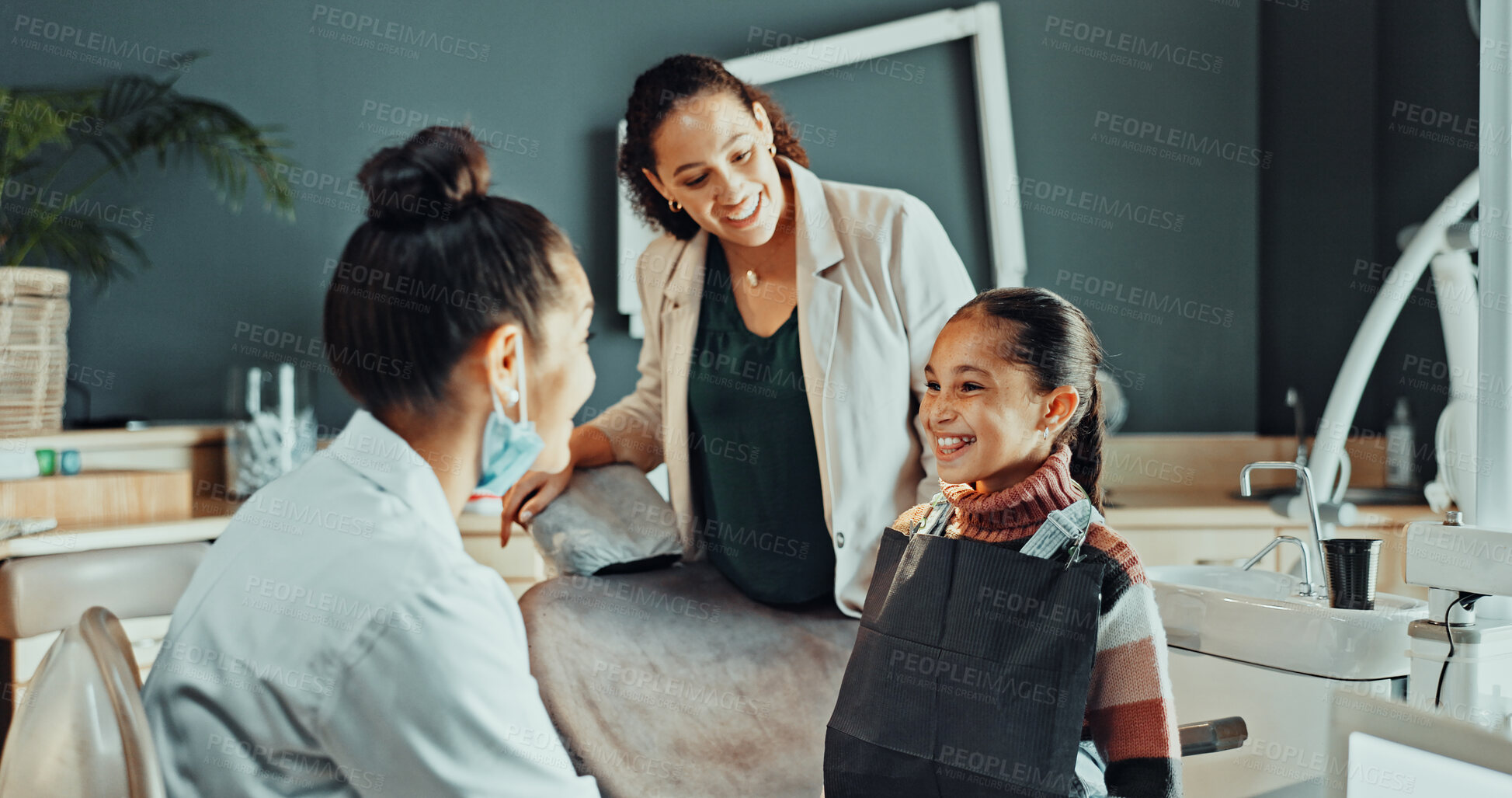 Buy stock photo Dentist, girl and mom with smile for consultation, cleaning or gum disease for dental help. Doctor, talking and kid with mother for teeth whitening, oral care or treatment plan for mouth procedure