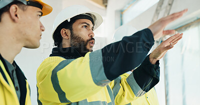 Buy stock photo Inspection, teamwork and men on construction site, pointing and discussion for property development. Civil engineering, people and quality assurance for renovation project, talking and collaboration