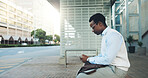 Phone, bus stop and waiting with black man in city for travel schedule, communication and chat. Location update, appointment and connection with business person and tech outdoor for contact or typing