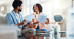 Happy, couple and reading at house with document, finance report and budget for household bills. Smile, people or review in home with paperwork, financial invoice and bank statement for rebate payout