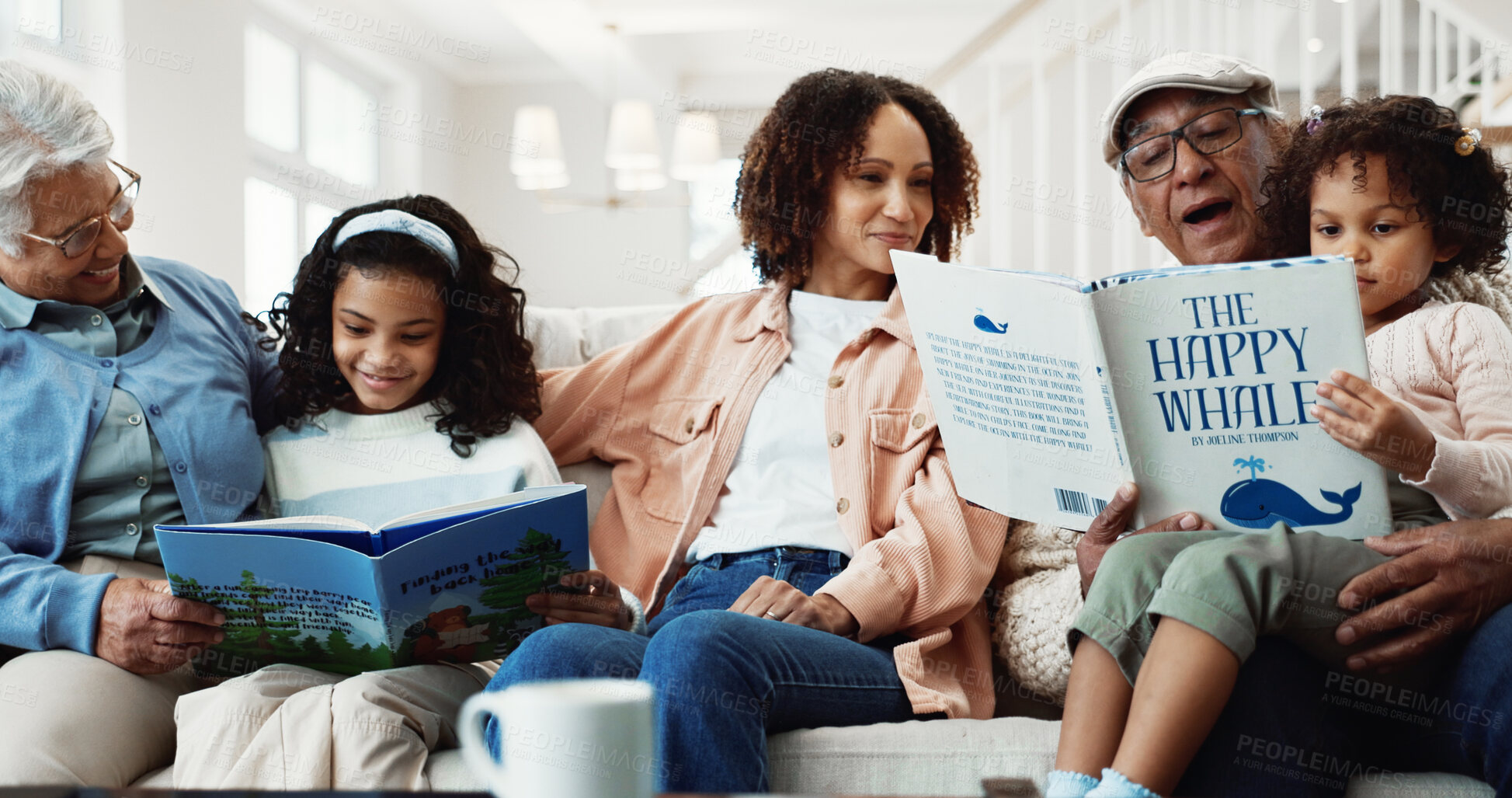 Buy stock photo Smile, big family and reading book in home with kids, learning or bonding with generations. Grandparents, happy children or mom with literature on sofa for storytelling, care or language education