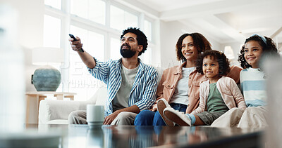 Buy stock photo Parents, smile and watching tv with children in lounge, love and channel change with remote in home. Happy people, bonding and streaming movie with kids, relax and family with subscription in house