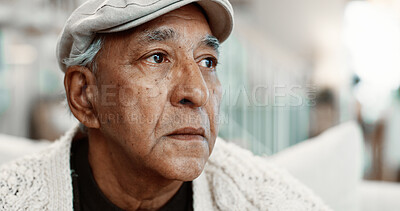 Buy stock photo Thinking, serious and senior man on sofa in home with reflection, nostalgia or reminder of retirement. Sad, memory and elderly person in living room for vision, pension or loneliness in apartment.